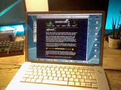 A PowerBook G4 15 inch displaying a local version of this website with Safari under Mac OS X 10.4 Tiger
