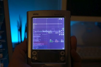Photo of my Palm Tungsten E2 running the PalmOS build of SunVox, open with just a blank project